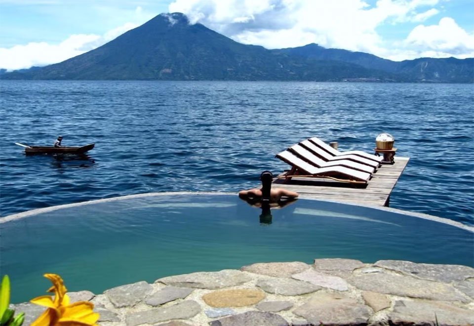 Outdoor pool & Lake Atitlán